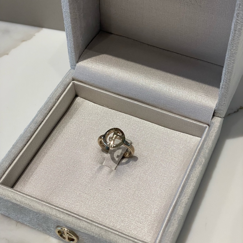 Giorgio Armani Gold Ring with Central Stone and Halo Design